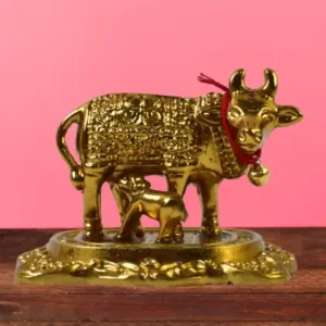 Metal golden kamdhenu cow with calf showpiece essential idols - ( default, OS ).