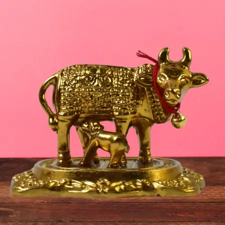 8tTTTAPOCiItKyQ5Md0UFLS9lBmJgzpYwX9cbSKJ.webp Metal golden kamdhenu cow with calf showpiece essential idols - ( default, OS ).