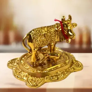 Metal golden kamdhenu cow with calf showpiece essential idols - ( default, OS ).