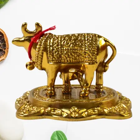 i5eGWiKge3YvfRDEQ1Xrr8wg0bppsbUX2fFyPfxb.webp Metal golden kamdhenu cow with calf showpiece essential idols - ( default, OS ).
